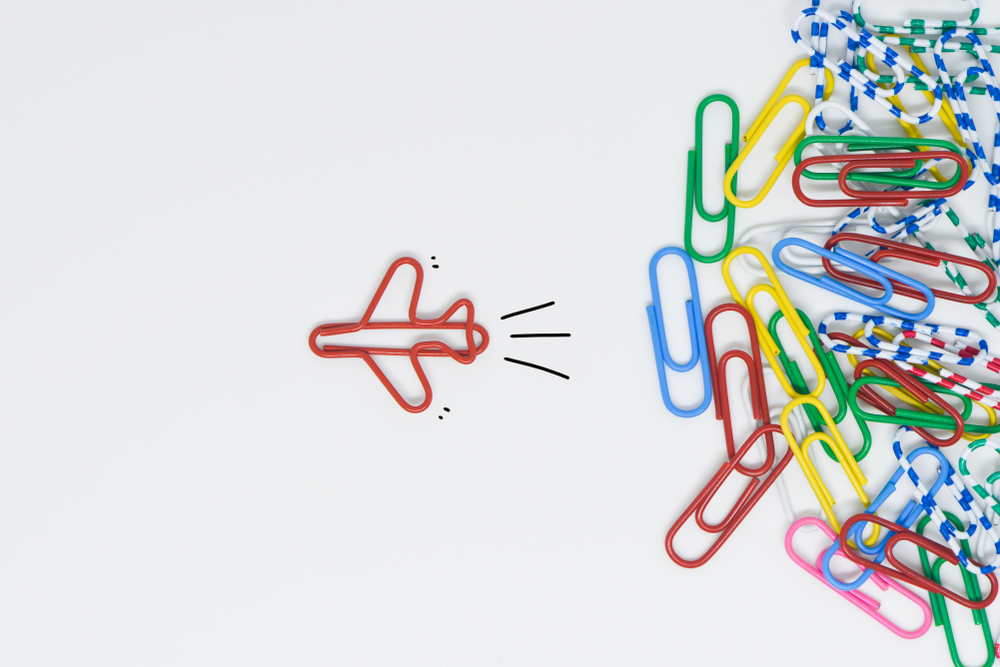Paper clips turning into an airplane demonstrating fresh perspectives