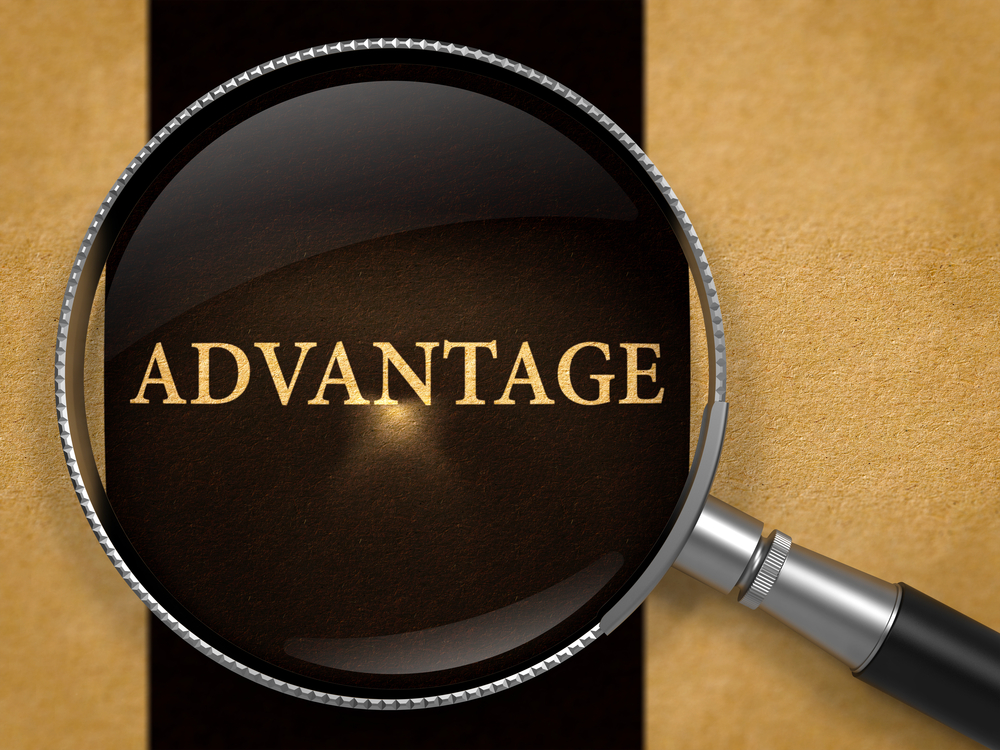 A magnifying glass over the word advantage.